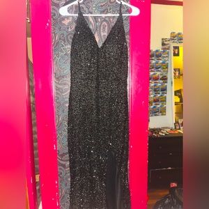 sequenced black dress with leg slit. tried it on and didn’t like it